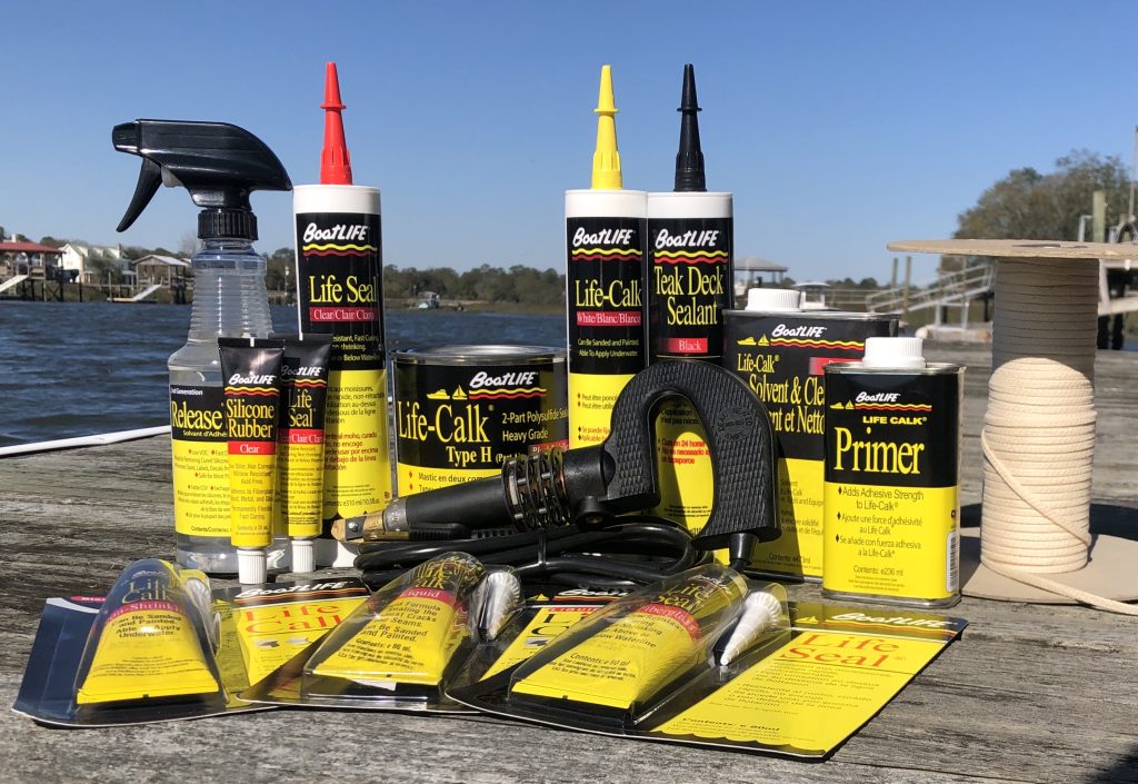 BoatLIFE boat cleaning products on a dock including boat wax, boating wax, and boat polish