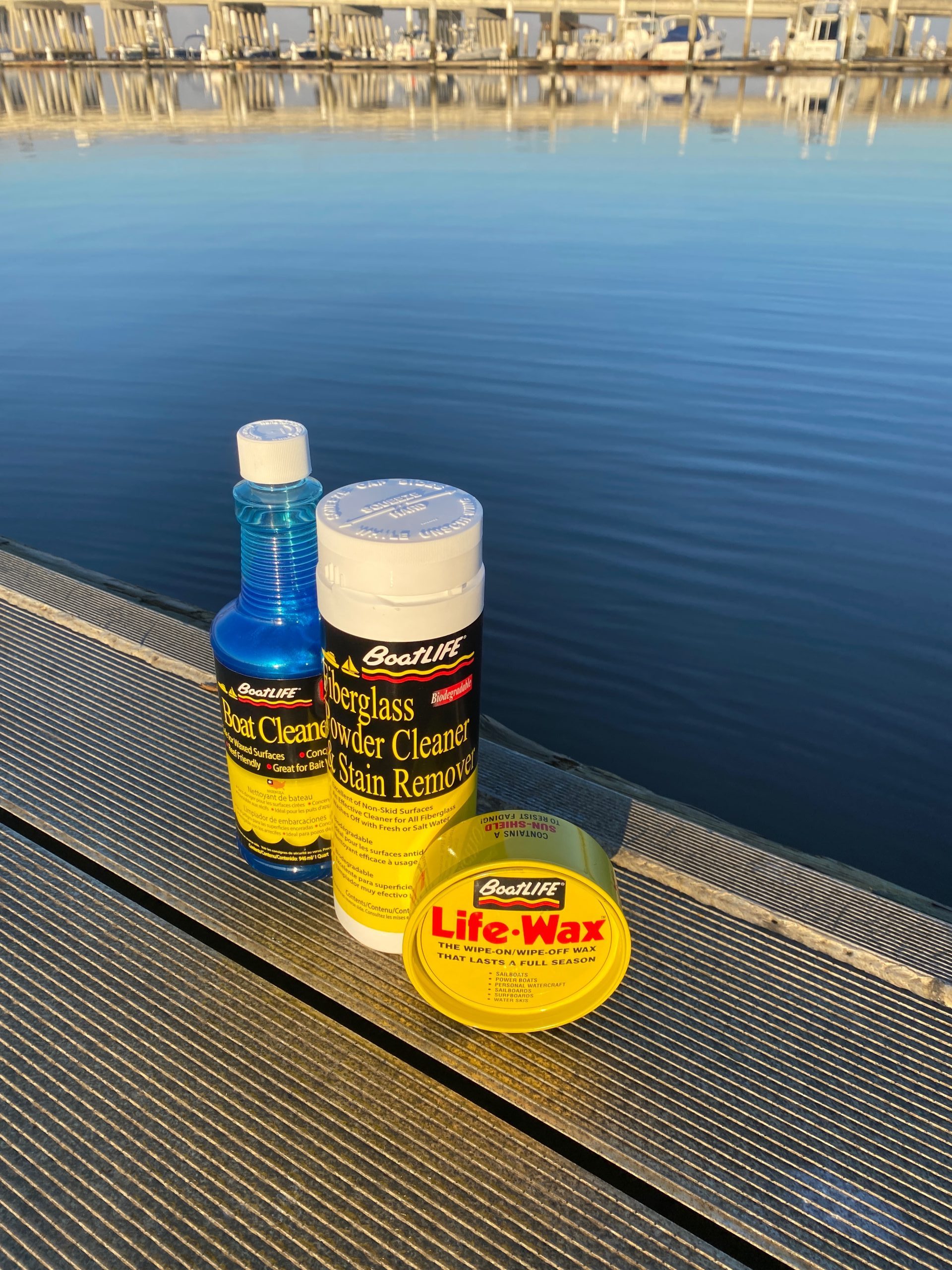 Boat Cleaner, Fiberglass Powder Cleaner and LifeWax on dock